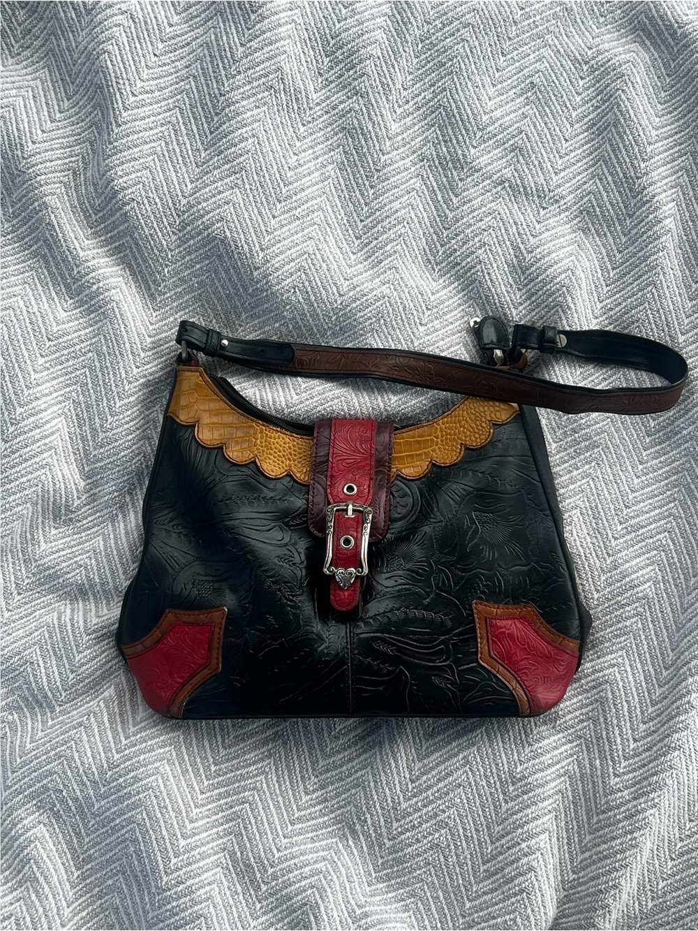 Textured Black Leather Shoulder Bag with Mustard Scallop and Red Accents